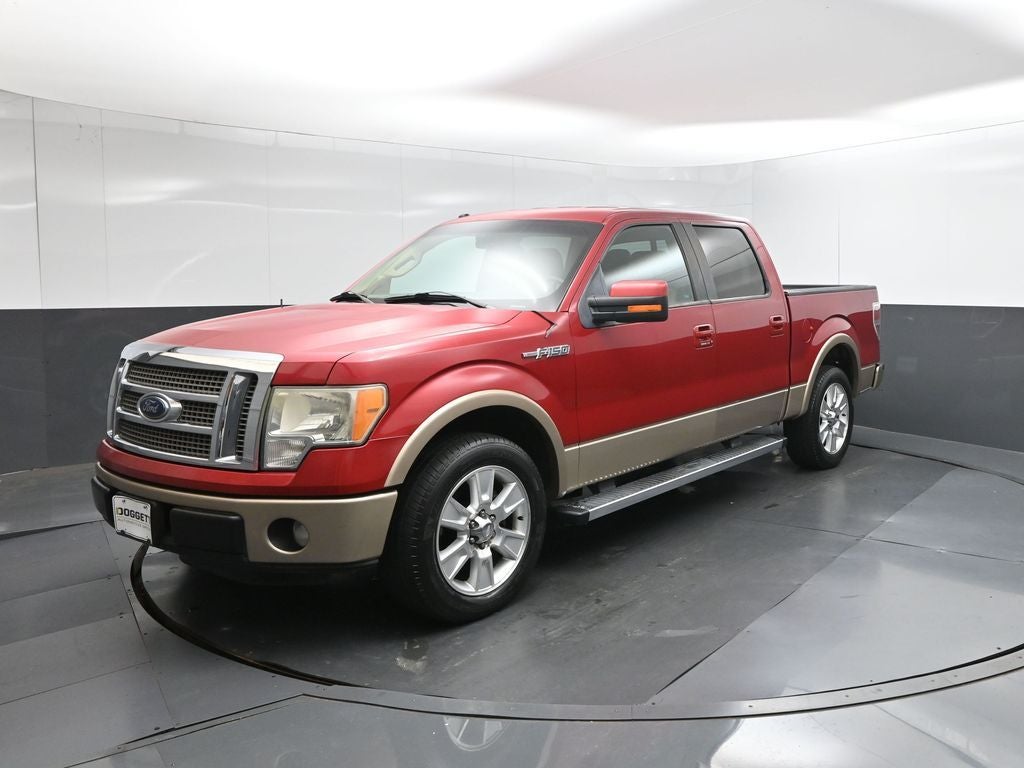 2012 Ford F-150 Lariat in Vermillion Red — front three-quarter view