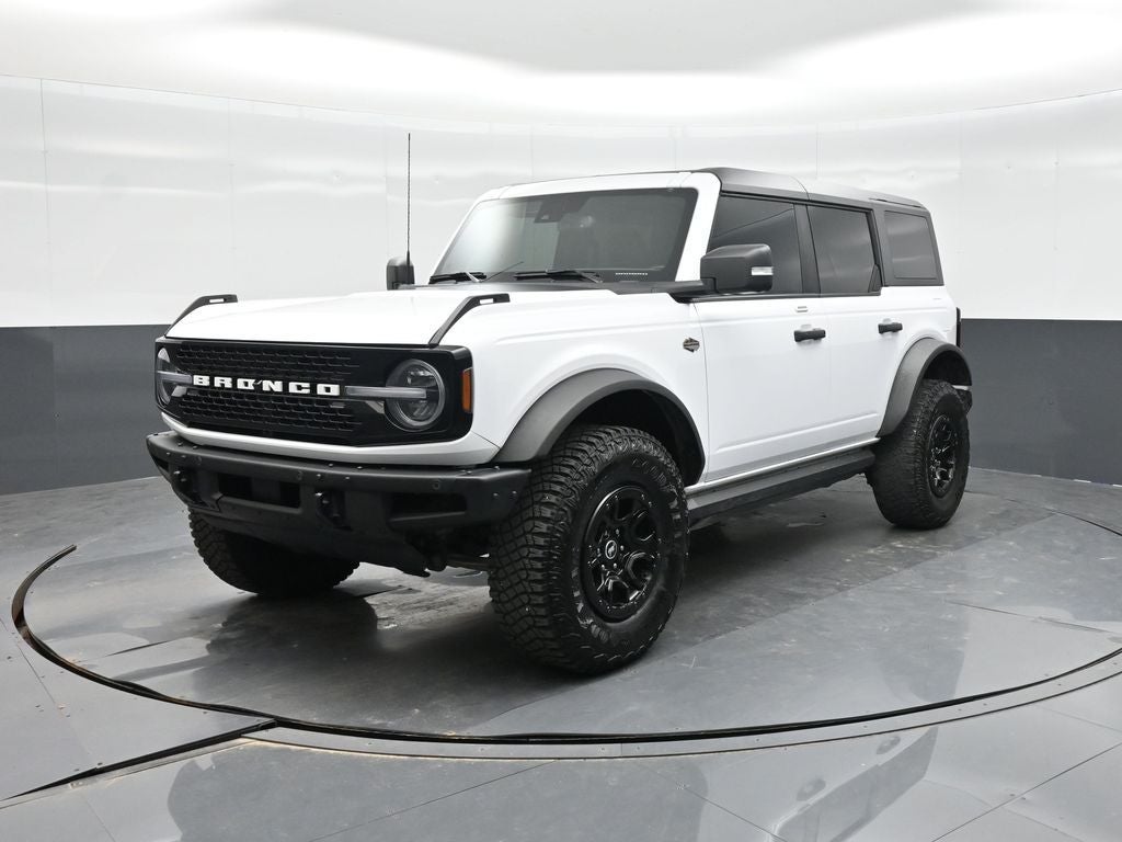 2023 Ford Bronco Wildtrak in Oxford White — front three-quarter view